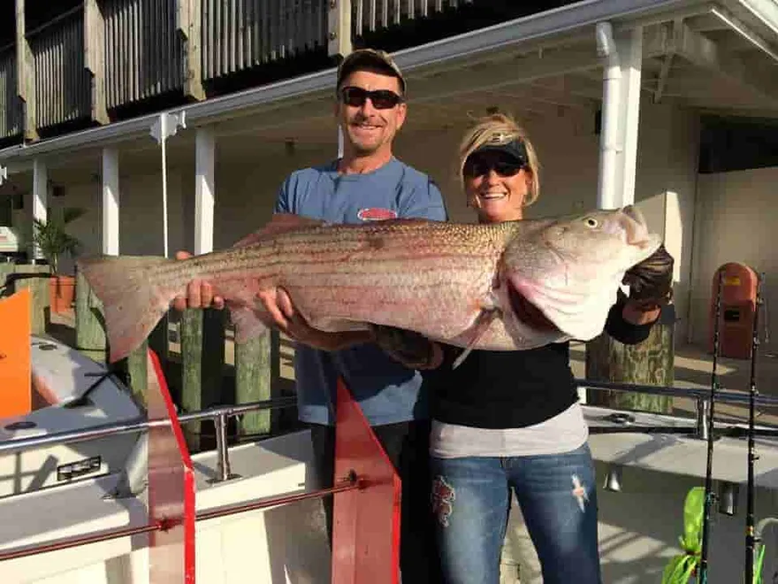 Don and Madie with a huge spring trophy striper